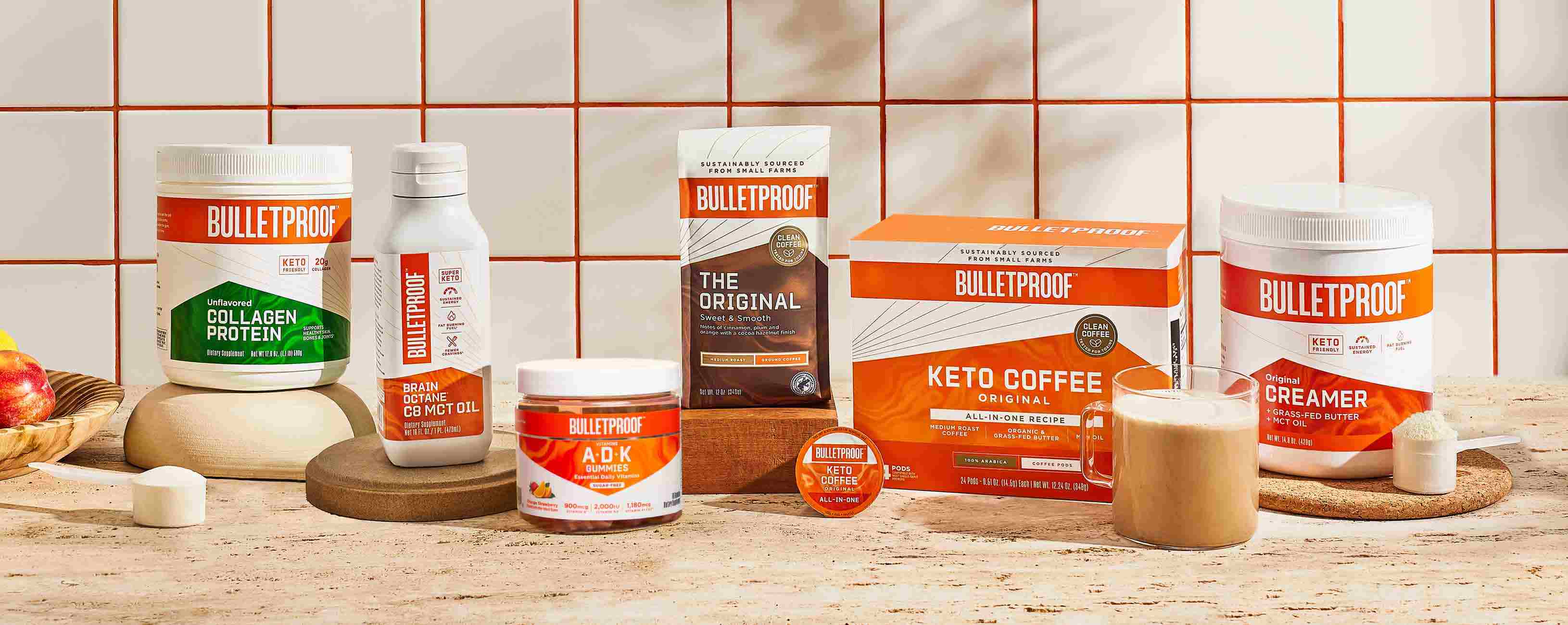 Bulletproof coffee, collagen and MCT oil products showcased on tabletop