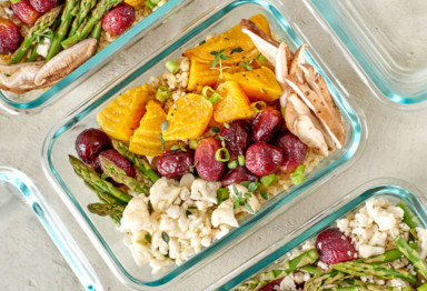 Vegetables and olives in glass meal prep containers