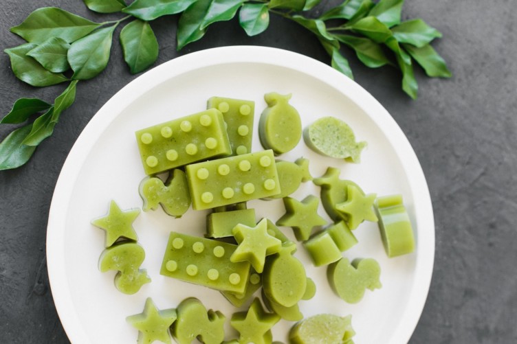 green gummies in different shapes